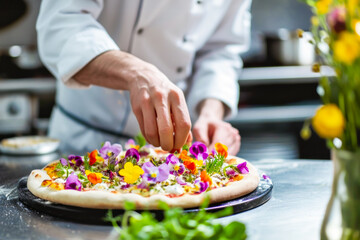 Obraz na płótnie Canvas Chef decorating sweet pizza with edible flowers, demonstrating culinary skills and passion for haute cuisine. Concept of sophistication, gastronomic experience and process of creating exquisite dishes