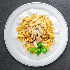 fusilli pasta with mussels seafood Mediterranean cuisine tasty fresh delicious healthy eating cooking appetizer meal food snack on the table copy space