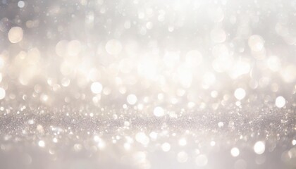 Fototapeta na wymiar festive glitter blurred shining silver background with bokeh and highlights