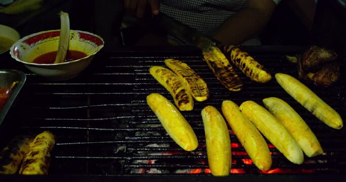 Preparing a delicious dessert dish of grilled banana.