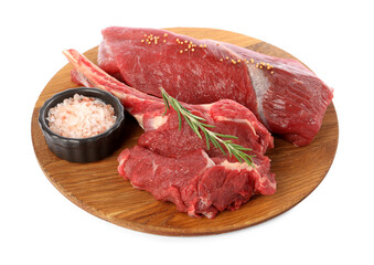 Pieces of raw beef meat and spices isolated on white