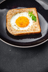fried egg bread toast scrambled yolk protein delicious breakfast hearty food fresh delicious healthy eating cooking appetizer meal food snack on the table