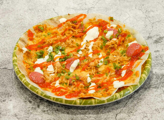 banh trang nuong pizza served in dish isolated on grey background top view of singapore seafood