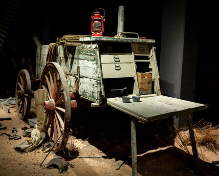 Old wood chuck wagon left in a barn