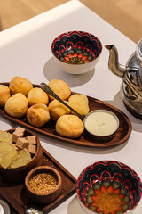 kazakh cuisine with traditional bread and tea