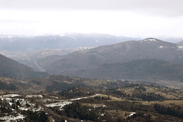 view from the top of mountain, fog in the mountains