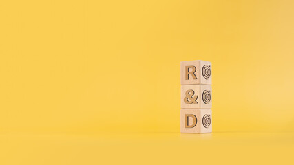 R and D - research and development symbol, Wooden blocks with text, Business and R and D concept,...