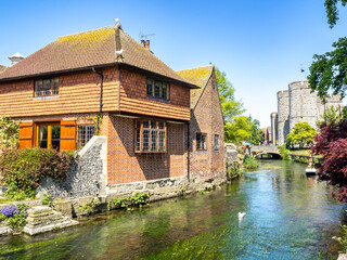 Typical buildings and Great Stour river in Caterbury city, England