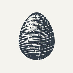 Decorated Easter Egg. Vintage black and white block print style hand drawn vector illustration with grunge texture.