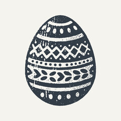 Decorated Easter Egg. Vintage black and white block print style hand drawn vector illustration with grunge texture.