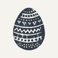 Decorated Easter Egg. Vintage black and white block print style hand drawn vector illustration with grunge texture.