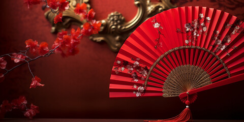 Chinese red traditional fan on red background