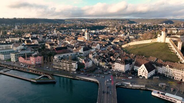 Aerial drone footage of the Schaffhausen old town by the Rhine river in eastern Switzerland