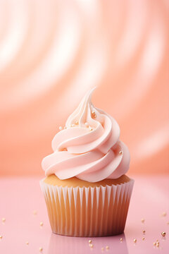 Cupcake with pink frosting on a peach bokeh background. Festive image for bakery's advertisement or children's birthday party service. Design for a cafe or dessert shop. Banner with copy space