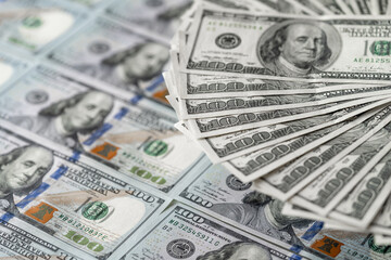 Stack of Twenty Dollar Bills in a Pile on Top of Each Other. A neat stack of twenty dollar bills sitting on top of each other.