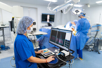 Neurosurgery process in modern clinic. Monitoring hospital technologies.