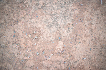 Imagen horizontal del suelo re cemento con piedras textura sucia