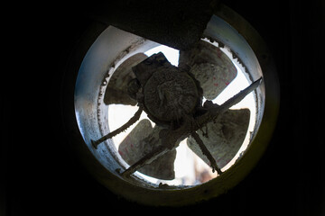 a very dirty fan impeller close-up, when used for a very long time in a car painting room