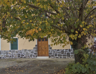 Naklejka premium in front of a Basque farmhouse with its strong door