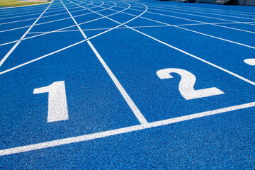 Blue treadmill for running in the stadium - 715072082