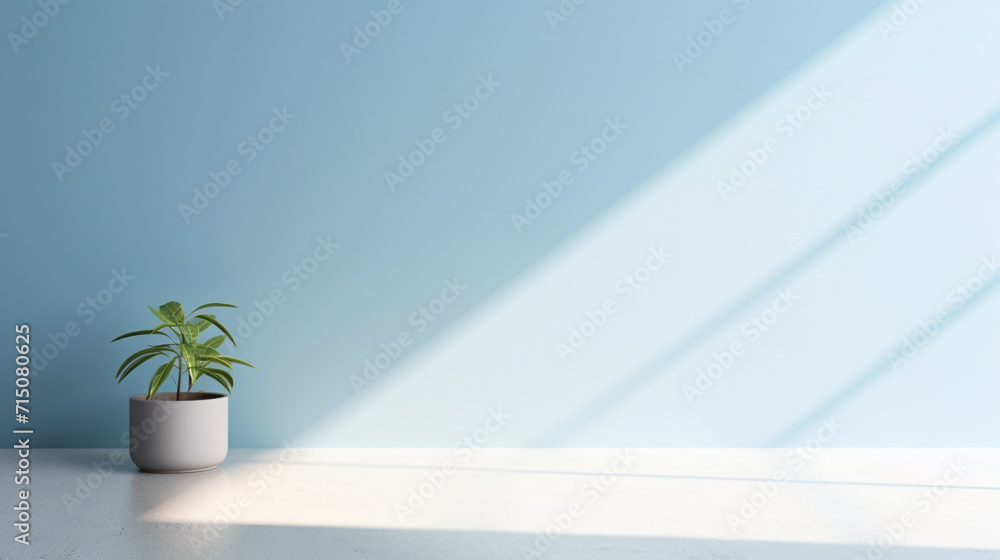 Poster sunlight falling onto a simple empty wall in light blue, empty space.