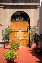 Fototapeta premium historic door of an old building monitored by cameras