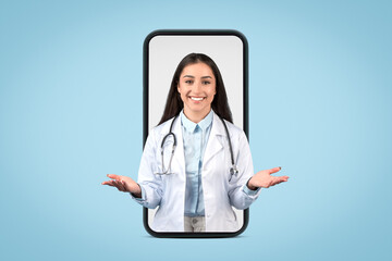 Friendly european female doctor with stethoscope emerges from smartphone screen, engaging with...