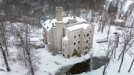 Karpniki Castle in winter scenery, Poland. - 715089079