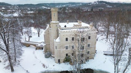 Karpniki Castle in winter scenery, Poland. - 715094067