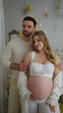 A happy married couple is expecting a baby