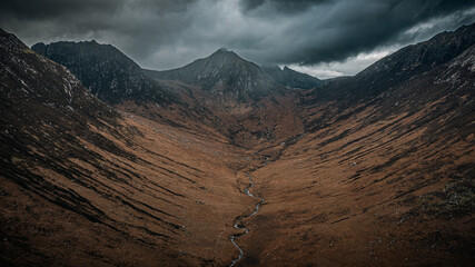 Mountain landscape with a dark cloud, creating a stunning shadow in Glen Rosa, Isle of Arran