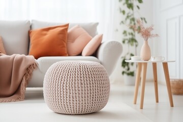 Cozy Home Setup, Knitted Pouf by White Sofa with Blanket, Comfortable Living Room Interior