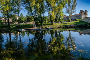Fototapeta na wymiar View of the Counts Park with the Cabe River and in the background on the right the Na Sa de la Antigua College Foundation. Monforte de Lemos, Galicia, Spain.