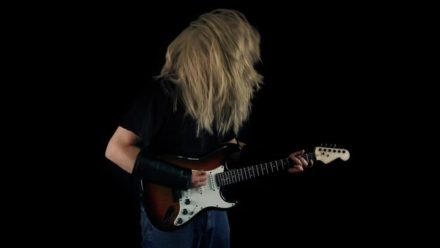 Rock Guitarist Playing Slow Motion
