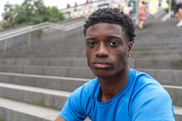 Portrait of Black Athlete on Urban Stairs