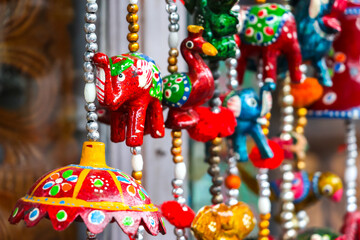 Puttaparthi, India. Indian traditional handicraft on the street market.
