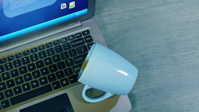 Accident Coffee Spills On Computer In Home Or Office
