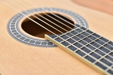 Obraz premium seven-string natur wooden guitar close-up 