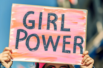 Pink “Grilr power” sign in demonstration, feminism