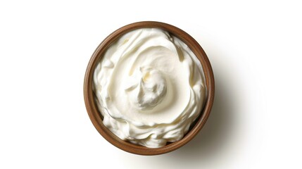 Top view of isolated bowl of sour cream or Greek yogurt on white background