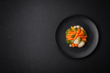 Delicious fresh vegetables broccoli, cauliflower, carrots steamed with salt and spices