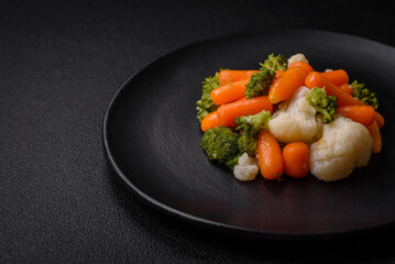 Delicious fresh vegetables broccoli, cauliflower, carrots steamed with salt and spices