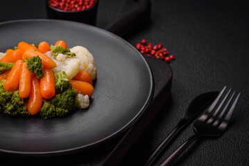 Delicious fresh vegetables broccoli, cauliflower, carrots steamed with salt and spices