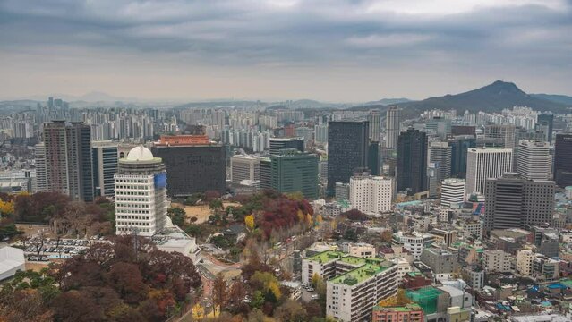 Seoul South Korea time lapse 4K, city skyline timelapse at Seoul city center view from Namsan Mountain in autumn