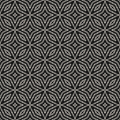 Vector geometric seamless pattern. Abstract black and white folk texture with ornamental grid, lattice, stars, floral shapes. Tribal ethnic motif. Dark background. Repeated geo design for decor, cover