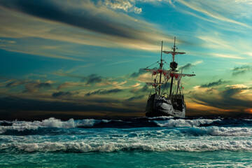 Grand view of an old sailing ship from the times of pirates on the high seas with big waves