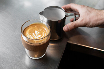 Barista Preparing a Cup of Coffee Latte
