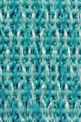 Close up of nylon green mesh fabric with plain weave threads textile pattern. Vertical photo