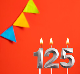 Birthday card - Number 125 candle in orange background