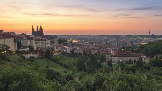 Prague Czechia Czech Republic time lapse 4K, high angle view city skyline night to day sunrise timelapse of old town and Prague Castle